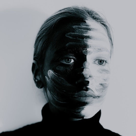 paradox woman with black and white face paint